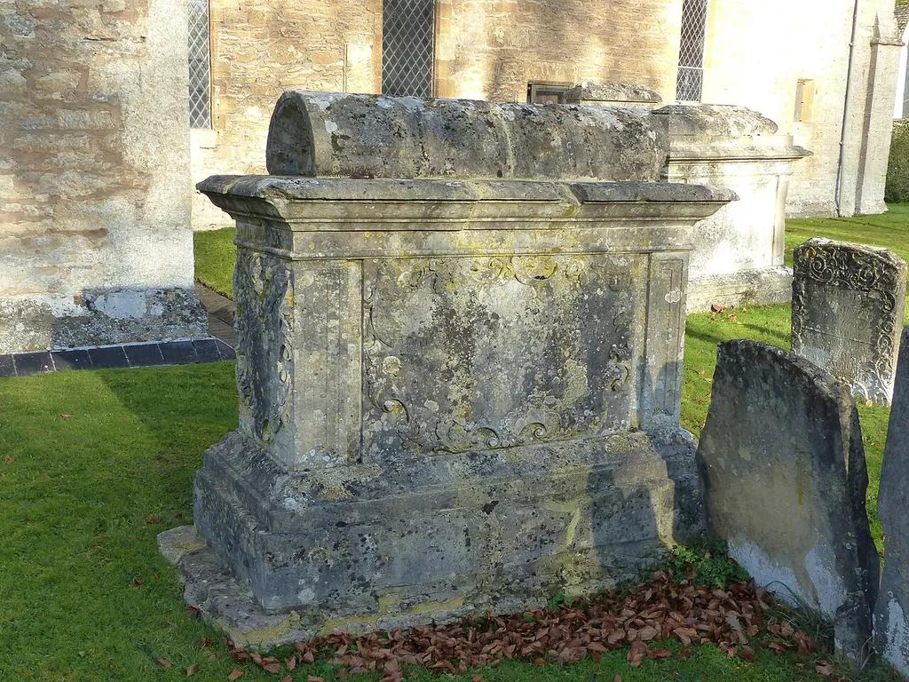 Grade II listed bale tomb in Bibury, Gloucestershire, listed as "Jasper Warren monument in the churchyard approximately 3 metres south of south aisle to Church of St Mary". .mw-parser-output .messagebox{margin:4px 0;width:auto;border-collapse:collapse;border:2px solid var(--border-color-progressive,#6485d1);background-color:var(--background-color-neutral-subtle,#fbfcff);color:var(--color-base,#202122);box-sizing:border-box;border-inline-start-width:8px}.mw-parser-output .messagebox.mbox-small{font-size:88%;line-height:1.25em}.mw-parser-output .mbox-warning,.mw-parser-output .mbox-speedy{border:2px solid var(--border-color-error,#b22222);background:var(--background-color-error-subtle,#ffdbdb);border-inline-start-width:8px}.mw-parser-output .mbox-serious,.mw-parser-output .mbox-delete,.mw-parser-output .mbox-stop{border:2px solid var(--border-color-error,#b22222);border-inline-start-width:8px}.mw-parser-output .mbox-issue,.mw-parser-output .mbox-content{border:2px solid #f28500;background:var(--background-color-warning-subtle,#ffe);border-inline-start-width:8px}.mw-parser-output .mbox-query,.mw-parser-output .mbox-style{border:2px solid #f4c430;background:var(--background-color-warning-subtle,#ffe);border-inline-start-width:8px}.mw-parser-output .mbox-shit{border:2px solid #960;border-inline-start-width:8px}.mw-parser-output .mbox-license{border:2px solid #88a;border-inline-start-width:initial}.mw-parser-output .mbox-legal{border:2px solid var(--border-color-notice,#666);background:var(--background-color-base,#fff);border-inline-start-width:8px}.mw-parser-output .mbox-honor{border:2px solid #ca3;background:var(--background-color-warning-subtle,#fcf4db);border-inline-start-width:8px}.mw-parser-output .mbox-growth{border:2px solid #8d4;background:var(--background-color-success-subtle,#d5fdf4);border-inline-start-width:8px}.mw-parser-output .mbox-move{border:2px solid #93c;border-inline-start-width:8px}.mw-parser-output .mbox-protection,.mw-parser-output .mbox-message{bo