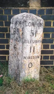 Milestone, Buckingham Road; NW edge of railway bridge parapet, by jct. with B4033 (Great Horwood Road)