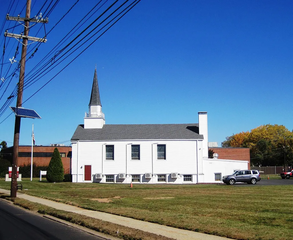 Photo of the First Presbyterian Church of Moonachie in Moonachie, New Jersey. Photo taken from County Route 503 (Moonachie Road) looking northeast.