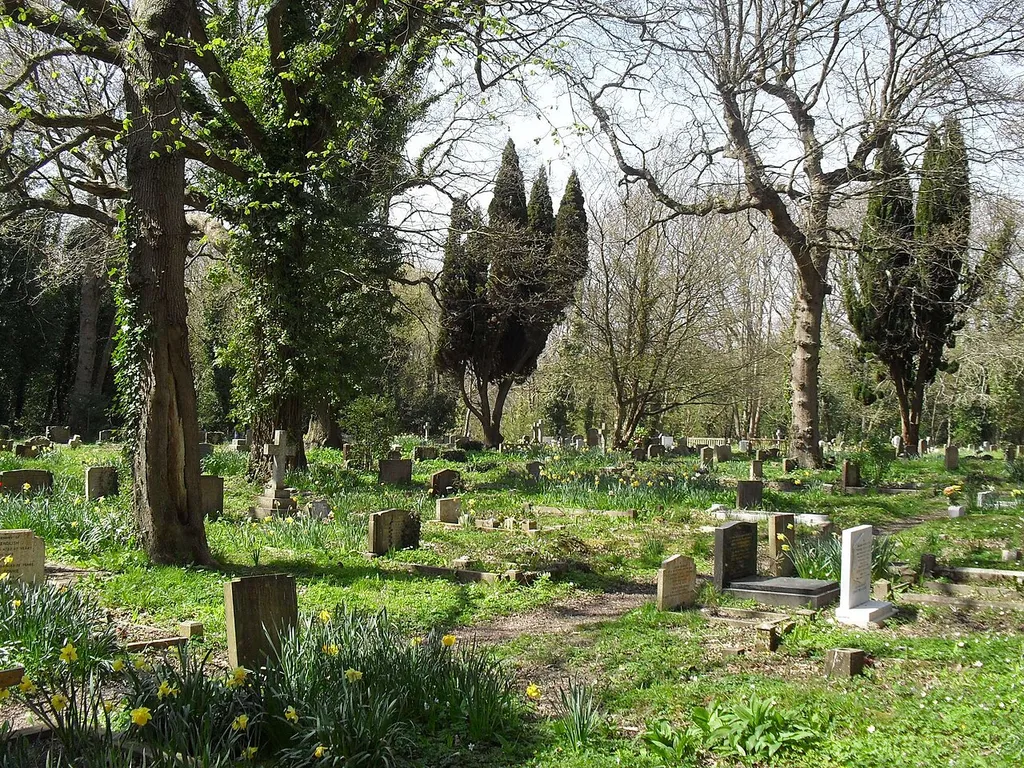 Churchyard at St Leonard's Church (Church-in-the-Wood), Church in the Wood Lane, Hollington, Hastings, East Sussex, England. This is a restored 13th-century Anglican church in the middle of a wood and nature reserve in the Hollington area of Hastings. Listed at Grade II by English Heritage (Heritage Gateway Code 293741)