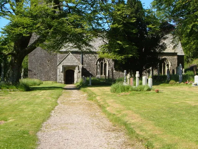 St Petroc's church, Harford. Seen from the lych gate. "Circa late C15 to early C16. Granite, with rough granite ashlar west tower. Slate roofs." https://historicengland.org.uk/listing/the-list/list-entry/1162617