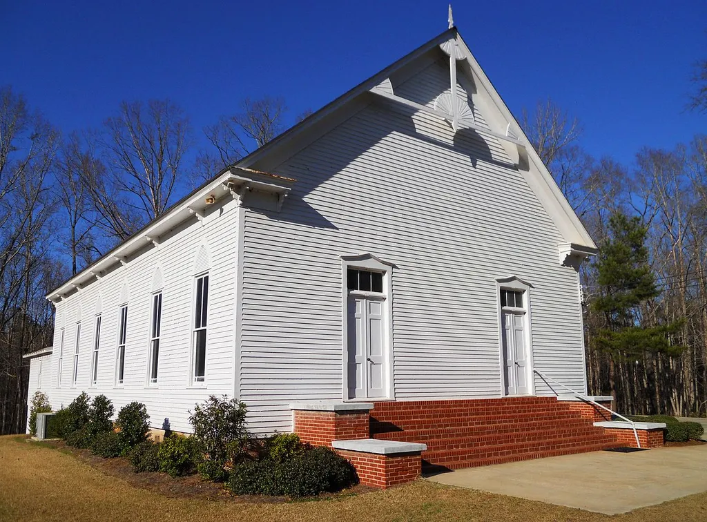This is a photograph of the County Line Baptist Church near Dudleyville, Alabama. The church was built in 1890 and was placed on the National Register of Historic Places on August 19, 1982.