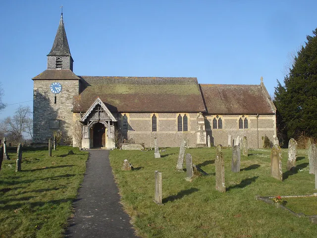 St Michael &amp; All Angels Church - 2 View north from the churchyard to the porch. The stone parts of the tower and the benches date from the 16th century, but today's building is mainly as a result of the major renovation in 1891.