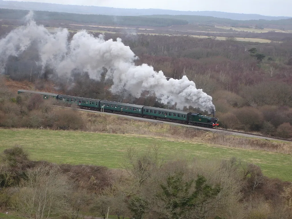 A train on the Swanage Railway seen from Corfe Castle