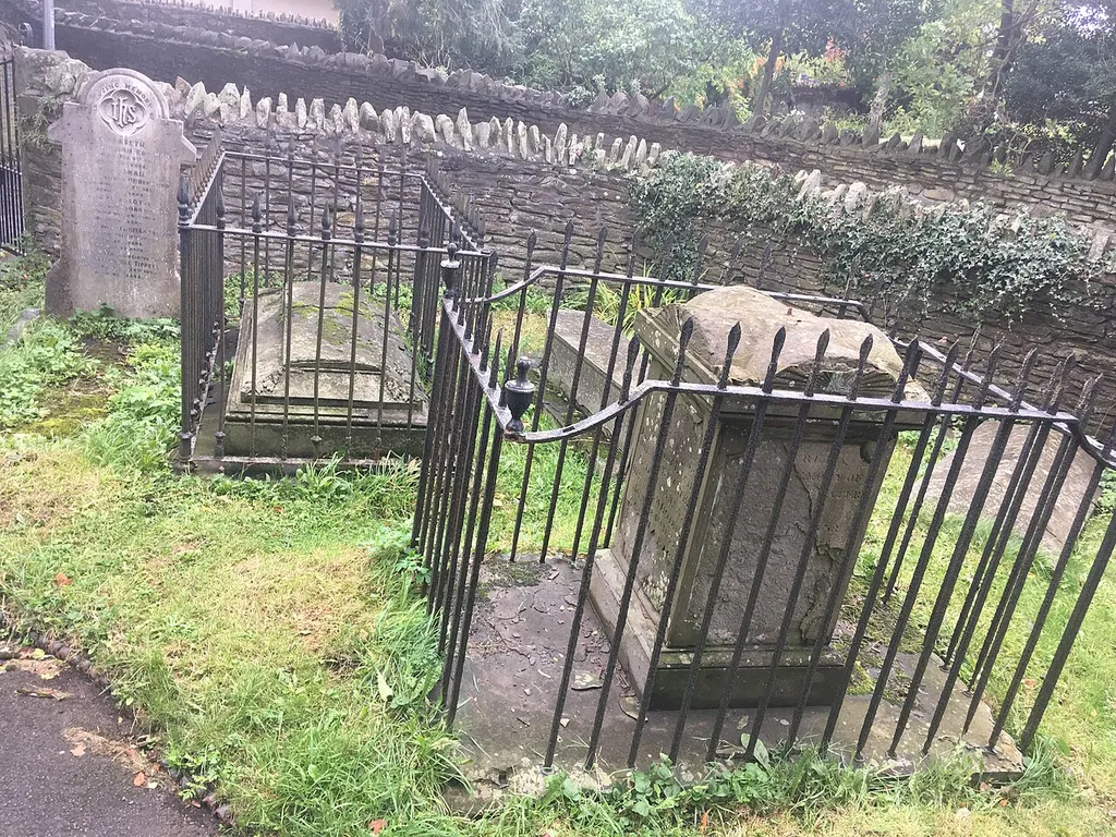 Group Of Three Tombs Approximately 2 Metres North West Of Church Of St Mary .mw-parser-output .messagebox{margin:4px 0;width:auto;border-collapse:collapse;border:2px solid var(--border-color-progressive,#6485d1);background-color:var(--background-color-neutral-subtle,#fbfcff);color:var(--color-base,#202122);box-sizing:border-box;border-inline-start-width:8px}.mw-parser-output .messagebox.mbox-small{font-size:88%;line-height:1.25em}.mw-parser-output .mbox-warning,.mw-parser-output .mbox-speedy{border:2px solid var(--border-color-error,#b22222);background:var(--background-color-error-subtle,#ffdbdb);border-inline-start-width:8px}.mw-parser-output .mbox-serious,.mw-parser-output .mbox-delete,.mw-parser-output .mbox-stop{border:2px solid var(--border-color-error,#b22222);border-inline-start-width:8px}.mw-parser-output .mbox-issue,.mw-parser-output .mbox-content{border:2px solid #f28500;background:var(--background-color-warning-subtle,#ffe);border-inline-start-width:8px}.mw-parser-output .mbox-query,.mw-parser-output .mbox-style{border:2px solid #f4c430;background:var(--background-color-warning-subtle,#ffe);border-inline-start-width:8px}.mw-parser-output .mbox-shit{border:2px solid #960;border-inline-start-width:8px}.mw-parser-output .mbox-license{border:2px solid #88a;border-inline-start-width:initial}.mw-parser-output .mbox-legal{border:2px solid var(--border-color-notice,#666);background:var(--background-color-base,#fff);border-inline-start-width:8px}.mw-parser-output .mbox-honor{border:2px solid #ca3;background:var(--background-color-warning-subtle,#fcf4db);border-inline-start-width:8px}.mw-parser-output .mbox-growth{border:2px solid #8d4;background:var(--background-color-success-subtle,#d5fdf4);border-inline-start-width:8px}.mw-parser-output .mbox-move{border:2px solid #93c;border-inline-start-width:8px}.mw-parser-output .mbox-protection,.mw-parser-output .mbox-message{border:2px solid var(--border-color-base,#aaa);border-inline-start-width:8px}.mw-parser-output .mes