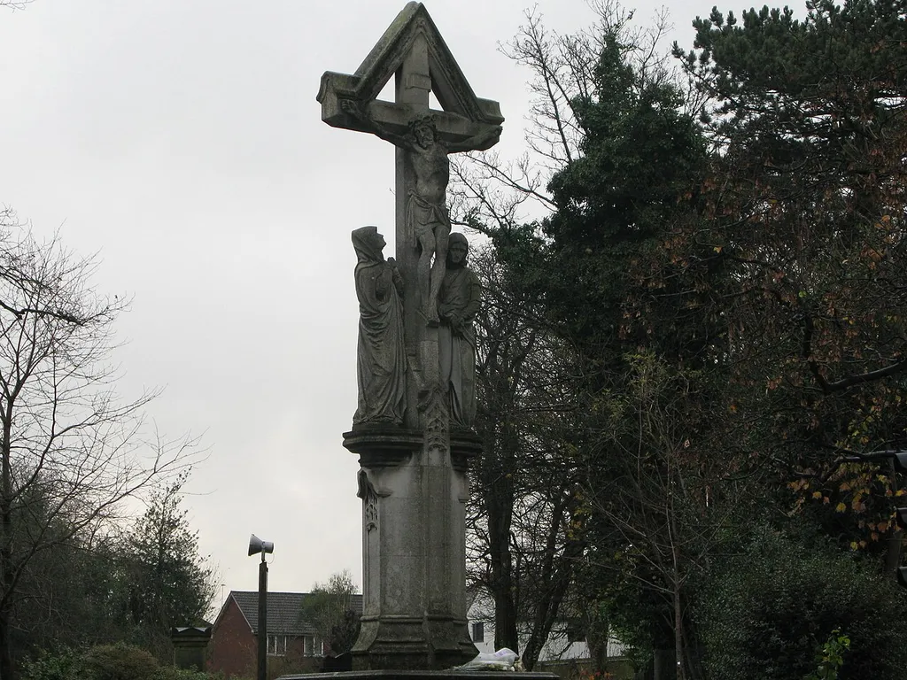 Grade II listed war memorial in churchyard of St Mary, Moseley, Birmingham.
