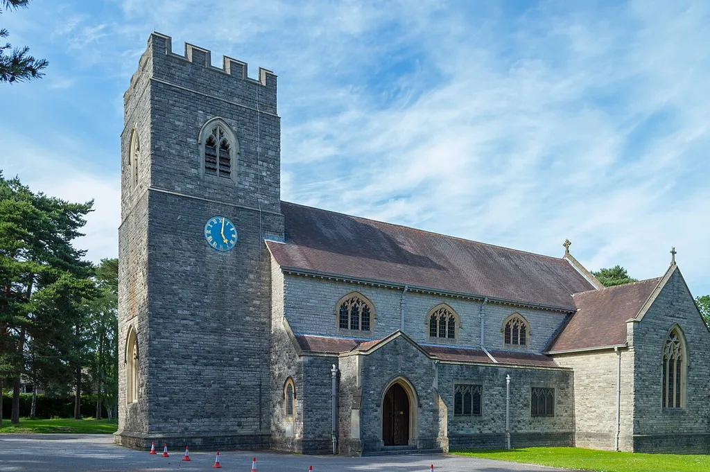 St Mary's parish church, Ferndown, Dorset, seen from the south. The land was given in 1932 and the nave was completed in 1933. The chancel and sanctuary were added in 1939, the transept and vestries in 1966, and tower completed in 1972.
