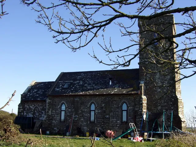 The former church of St Edrin or Edern, Llanedren, Pembrokeshire, seen from the north. The present church was built in 1846 but several much earlier crosses survive on the site. Its former parish had no centre of settlement and in 1833 its population numbered 113. The building is now a private house.