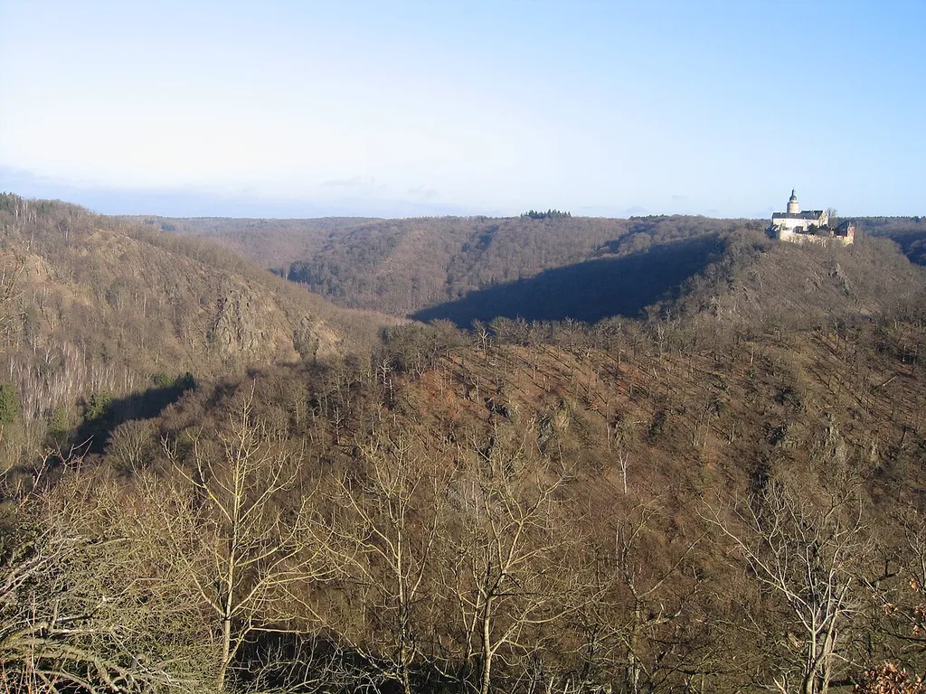 View of the Selke valley and Falkenstein Castle from the Selkesicht viewing point in the Harz Mountains of Germany