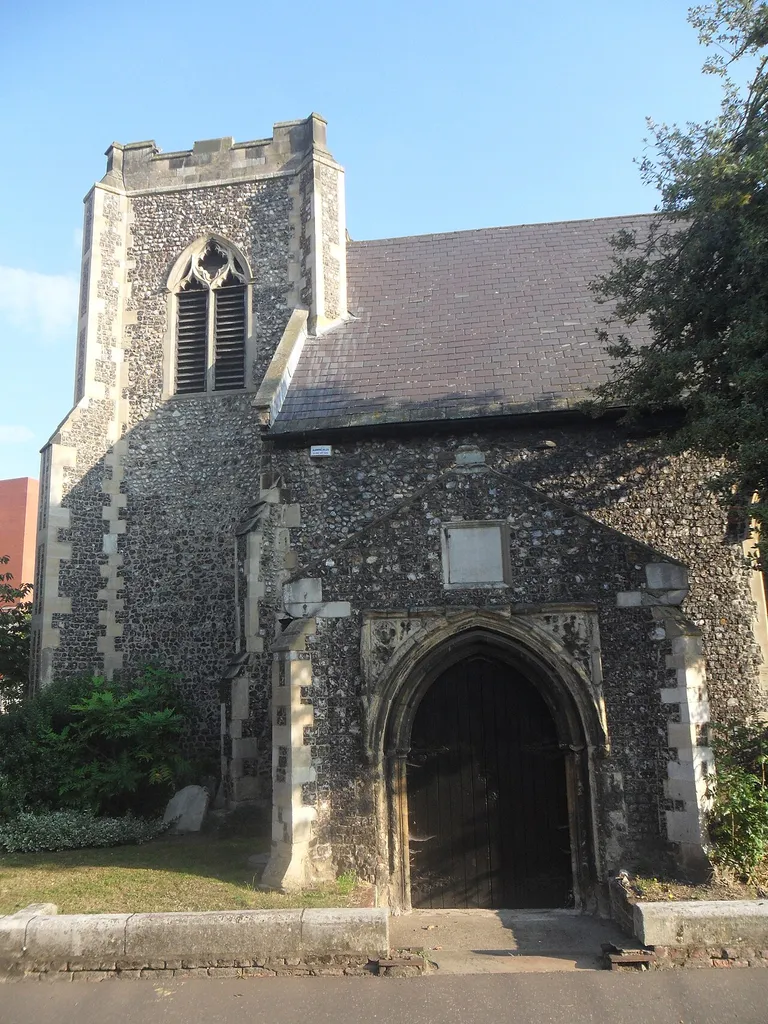 South porch and west tower of the former parish church of St Saviour, St Saviour's Lane, Norwich, seen from the south