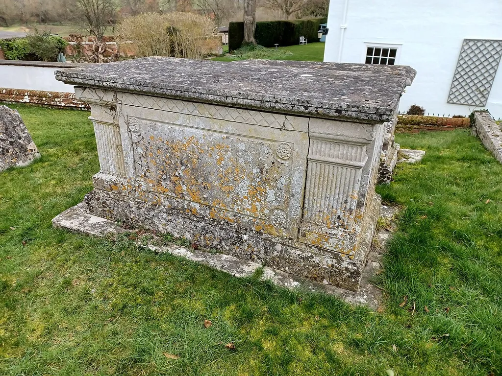 Table Tomb 7 Metres North Of Church Of All Saints, Barton Stacey, Hampshire, England. Early 19th century, Grade II listed. .mw-parser-output .messagebox{margin:4px 0;width:auto;border-collapse:collapse;border:2px solid var(--border-color-progressive,#6485d1);background-color:var(--background-color-neutral-subtle,#fbfcff);color:var(--color-base,#202122);box-sizing:border-box;border-inline-start-width:8px}.mw-parser-output .messagebox.mbox-small{font-size:88%;line-height:1.25em}.mw-parser-output .mbox-warning,.mw-parser-output .mbox-speedy{border:2px solid var(--border-color-error,#b22222);background:var(--background-color-error-subtle,#ffdbdb);border-inline-start-width:8px}.mw-parser-output .mbox-serious,.mw-parser-output .mbox-delete,.mw-parser-output .mbox-stop{border:2px solid var(--border-color-error,#b22222);border-inline-start-width:8px}.mw-parser-output .mbox-issue,.mw-parser-output .mbox-content{border:2px solid #f28500;background:var(--background-color-warning-subtle,#ffe);border-inline-start-width:8px}.mw-parser-output .mbox-query,.mw-parser-output .mbox-style{border:2px solid #f4c430;background:var(--background-color-warning-subtle,#ffe);border-inline-start-width:8px}.mw-parser-output .mbox-shit{border:2px solid #960;border-inline-start-width:8px}.mw-parser-output .mbox-license{border:2px solid #88a;border-inline-start-width:initial}.mw-parser-output .mbox-legal{border:2px solid var(--border-color-notice,#666);background:var(--background-color-base,#fff);border-inline-start-width:8px}.mw-parser-output .mbox-honor{border:2px solid #ca3;background:var(--background-color-warning-subtle,#fcf4db);border-inline-start-width:8px}.mw-parser-output .mbox-growth{border:2px solid #8d4;background:var(--background-color-success-subtle,#d5fdf4);border-inline-start-width:8px}.mw-parser-output .mbox-move{border:2px solid #93c;border-inline-start-width:8px}.mw-parser-output .mbox-protection,.mw-parser-output .mbox-message{border:2px solid var(--border-color-base,#aaa);borde