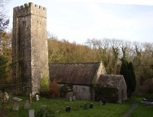 Gumfreston Church. St Lawrence's Church is romantically situated in a wooded dell. It is generally of the 14C to 16C, and has nave, chancel with a small rib-vaulted south chapel, and a west porch (which may be the remains of an older building). The tower was formerly detached. The church was well restored in 1869, including new roofs and church furnishings. Outside there is the shaft of a churchyard cross, and three medicinal springs rise in the churchyard, the water of which contains iron and chalybeate. In the wood to the south of the churchyard wall are the ruins of the village that stood beside the quay on the river estuary. This was a transfer point for goods from the road to little coasting vessels. It was also on the pilgrimage route across south Wales to St David's.