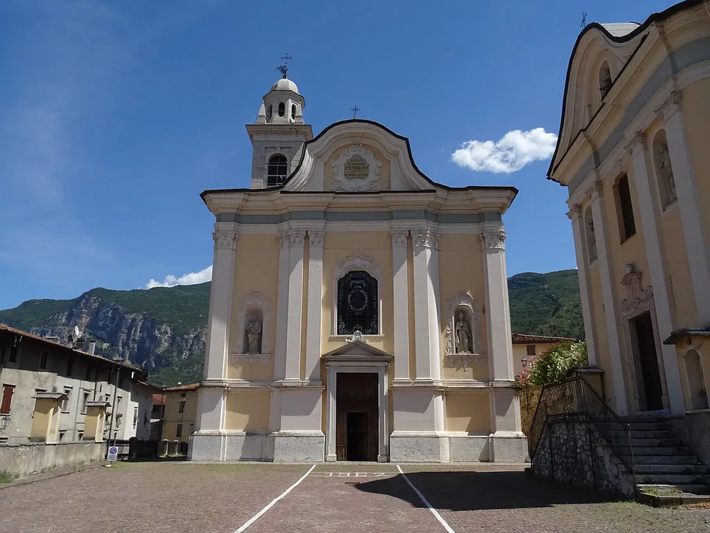 Volano (Trentino, Italy), Purification of Mary church; on the side, the Holy Trinity oratory