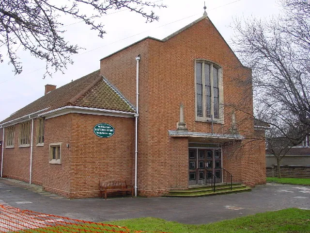 Horfield United Reformed Church, Muller Road, Bristol, seen from the northwest. The original church is to the left of this photograph and is now the church hall. It was built in 1933 as Muller Road Congregational Church. The present church was built in 1957. The sign above the door says Whitefield Memorial Tabernacle.