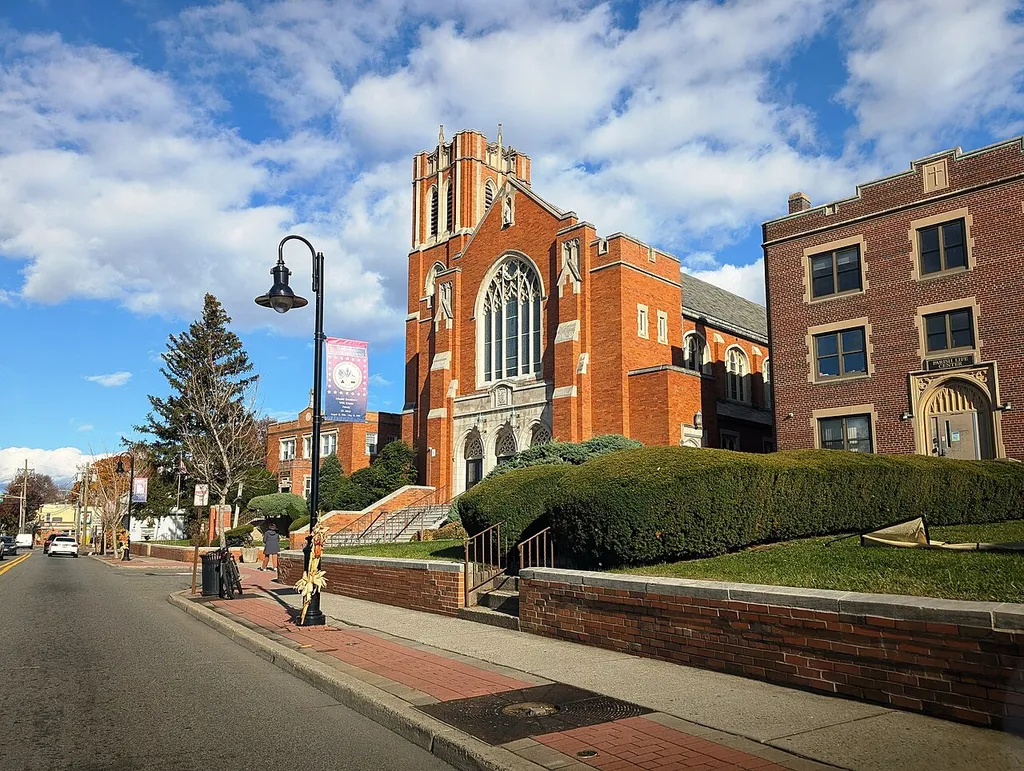 Photo of St. John the Evangelist Roman Catholic Church in Bergenfield, New Jersey. Photo taken from County Route 39 (Washington Avenue) looking east-northeast.
