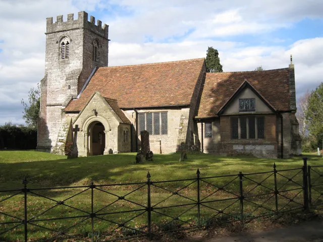 Church of St Mary the Virgin, Haseley. Little has changed since 2005. A section of fence is missing, out of shot, left, perhaps a casualty of large vehicle, narrow lane, sharp bend. The long shadow across the churchyard and over the chancel is cast by a Wellingtonia or Giant Redwood (Sequoiadendron giganteum) growing in a small plantation behind the camera, east of the old rectory 1756973.