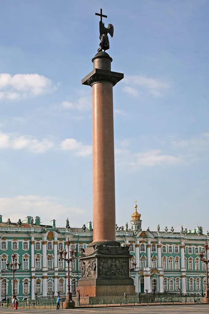 Alexander Column on Palace Square in Saint Petersburg. The Dorian column by the architect Montferrand, weighing 650 tonnes and 47 meters high, is considered the largest monument in the world, which is stable without anchoring and only by its own weight. In the background the Winter Palace (Hermitage Art Museum).