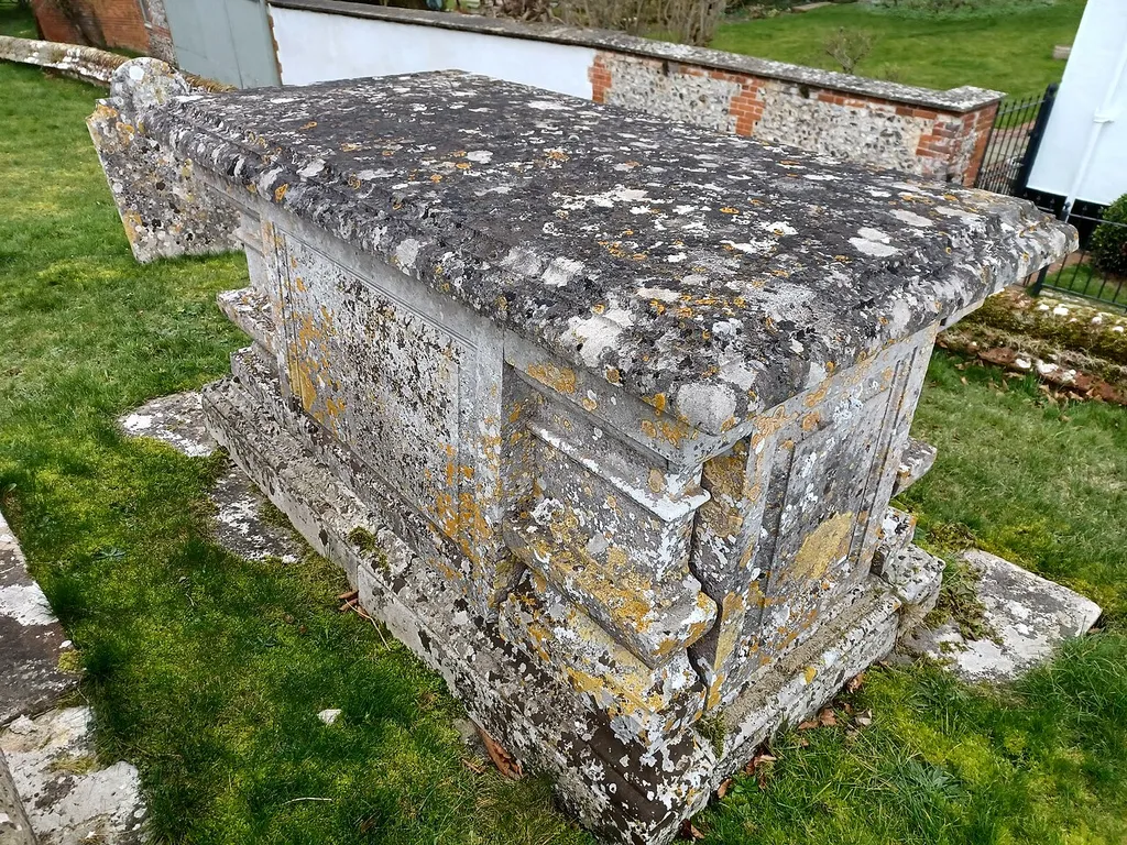 Table Tomb 9 Metres North Of Church Of All Saints, Barton Stacey, Hampshire, England. c1800, Grade II listed. .mw-parser-output .messagebox{margin:4px 0;width:auto;border-collapse:collapse;border:2px solid var(--border-color-progressive,#6485d1);background-color:var(--background-color-neutral-subtle,#fbfcff);color:var(--color-base,#202122);box-sizing:border-box;border-inline-start-width:8px}.mw-parser-output .messagebox.mbox-small{font-size:88%;line-height:1.25em}.mw-parser-output .mbox-warning,.mw-parser-output .mbox-speedy{border:2px solid var(--border-color-error,#b22222);background:var(--background-color-error-subtle,#ffdbdb);border-inline-start-width:8px}.mw-parser-output .mbox-serious,.mw-parser-output .mbox-delete,.mw-parser-output .mbox-stop{border:2px solid var(--border-color-error,#b22222);border-inline-start-width:8px}.mw-parser-output .mbox-issue,.mw-parser-output .mbox-content{border:2px solid #f28500;background:var(--background-color-warning-subtle,#ffe);border-inline-start-width:8px}.mw-parser-output .mbox-query,.mw-parser-output .mbox-style{border:2px solid #f4c430;background:var(--background-color-warning-subtle,#ffe);border-inline-start-width:8px}.mw-parser-output .mbox-shit{border:2px solid #960;border-inline-start-width:8px}.mw-parser-output .mbox-license{border:2px solid #88a;border-inline-start-width:initial}.mw-parser-output .mbox-legal{border:2px solid var(--border-color-notice,#666);background:var(--background-color-base,#fff);border-inline-start-width:8px}.mw-parser-output .mbox-honor{border:2px solid #ca3;background:var(--background-color-warning-subtle,#fcf4db);border-inline-start-width:8px}.mw-parser-output .mbox-growth{border:2px solid #8d4;background:var(--background-color-success-subtle,#d5fdf4);border-inline-start-width:8px}.mw-parser-output .mbox-move{border:2px solid #93c;border-inline-start-width:8px}.mw-parser-output .mbox-protection,.mw-parser-output .mbox-message{border:2px solid var(--border-color-base,#aaa);border-inline-star