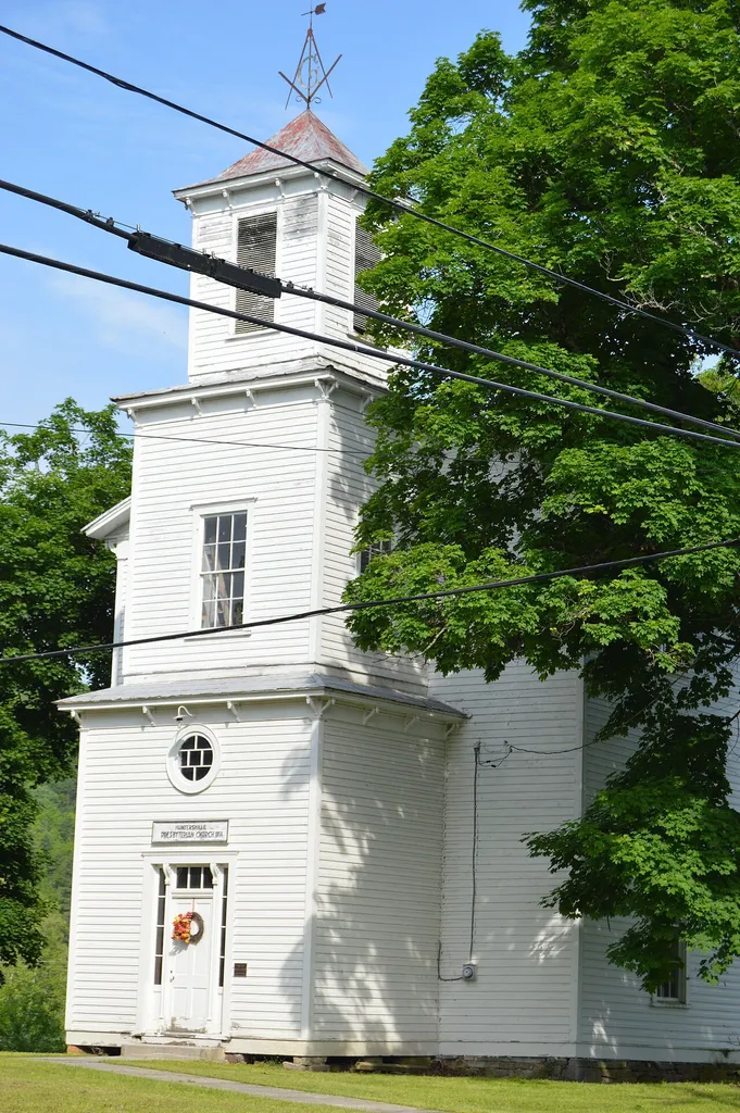 Front of the Huntersville Presbyterian Church, located at the intersection of West Virginia Route 39 and Beaver Creek Road at Huntersville in Pocahontas County, West Virginia, United States. Built in 1854 and expanded in 1896 to add Masonic lodge space, it is listed on the National Register of Historic Places.