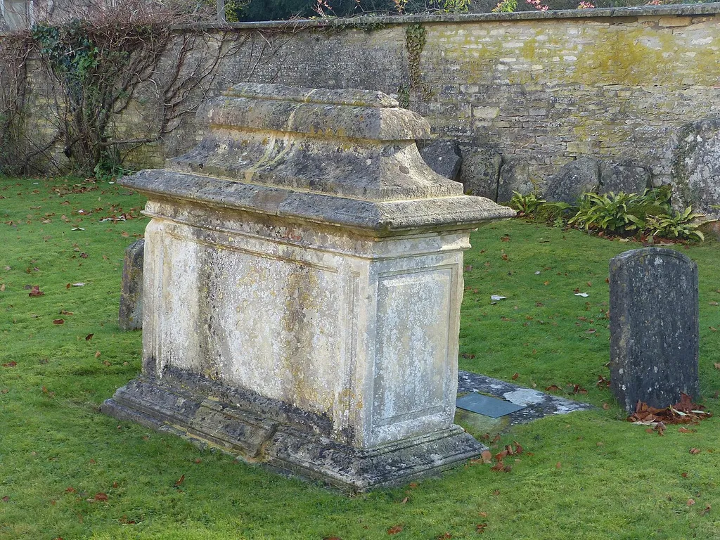 Grade II listed chest tomb in Bibury, Gloucestershire, listed as "John Marchant monument in the churchyard approximately 20 metres south of chancel to Church of St Mary". .mw-parser-output .messagebox{margin:4px 0;width:auto;border-collapse:collapse;border:2px solid var(--border-color-progressive,#6485d1);background-color:var(--background-color-neutral-subtle,#fbfcff);color:var(--color-base,#202122);box-sizing:border-box;border-inline-start-width:8px}.mw-parser-output .messagebox.mbox-small{font-size:88%;line-height:1.25em}.mw-parser-output .mbox-warning,.mw-parser-output .mbox-speedy{border:2px solid var(--border-color-error,#b22222);background:var(--background-color-error-subtle,#ffdbdb);border-inline-start-width:8px}.mw-parser-output .mbox-serious,.mw-parser-output .mbox-delete,.mw-parser-output .mbox-stop{border:2px solid var(--border-color-error,#b22222);border-inline-start-width:8px}.mw-parser-output .mbox-issue,.mw-parser-output .mbox-content{border:2px solid #f28500;background:var(--background-color-warning-subtle,#ffe);border-inline-start-width:8px}.mw-parser-output .mbox-query,.mw-parser-output .mbox-style{border:2px solid #f4c430;background:var(--background-color-warning-subtle,#ffe);border-inline-start-width:8px}.mw-parser-output .mbox-shit{border:2px solid #960;border-inline-start-width:8px}.mw-parser-output .mbox-license{border:2px solid #88a;border-inline-start-width:initial}.mw-parser-output .mbox-legal{border:2px solid var(--border-color-notice,#666);background:var(--background-color-base,#fff);border-inline-start-width:8px}.mw-parser-output .mbox-honor{border:2px solid #ca3;background:var(--background-color-warning-subtle,#fcf4db);border-inline-start-width:8px}.mw-parser-output .mbox-growth{border:2px solid #8d4;background:var(--background-color-success-subtle,#d5fdf4);border-inline-start-width:8px}.mw-parser-output .mbox-move{border:2px solid #93c;border-inline-start-width:8px}.mw-parser-output .mbox-protection,.mw-parser-output .mbox-message{bord