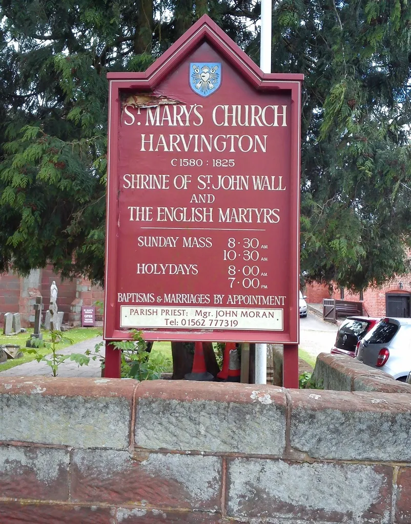 Sign outside the Roman Catholic church of St Mary, Chaddesley Corbett, Worcestershire