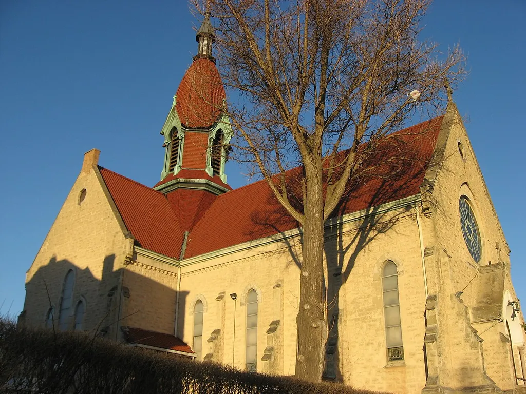 Front and western side of St. Pius X Catholic Church (formerly St. Patrick's Catholic Church), located at 1662 Blue Rock Street in the Northside neighborhood of Cincinnati, Ohio, United States. Built in 1873, it is listed on the National Register of Historic Places.