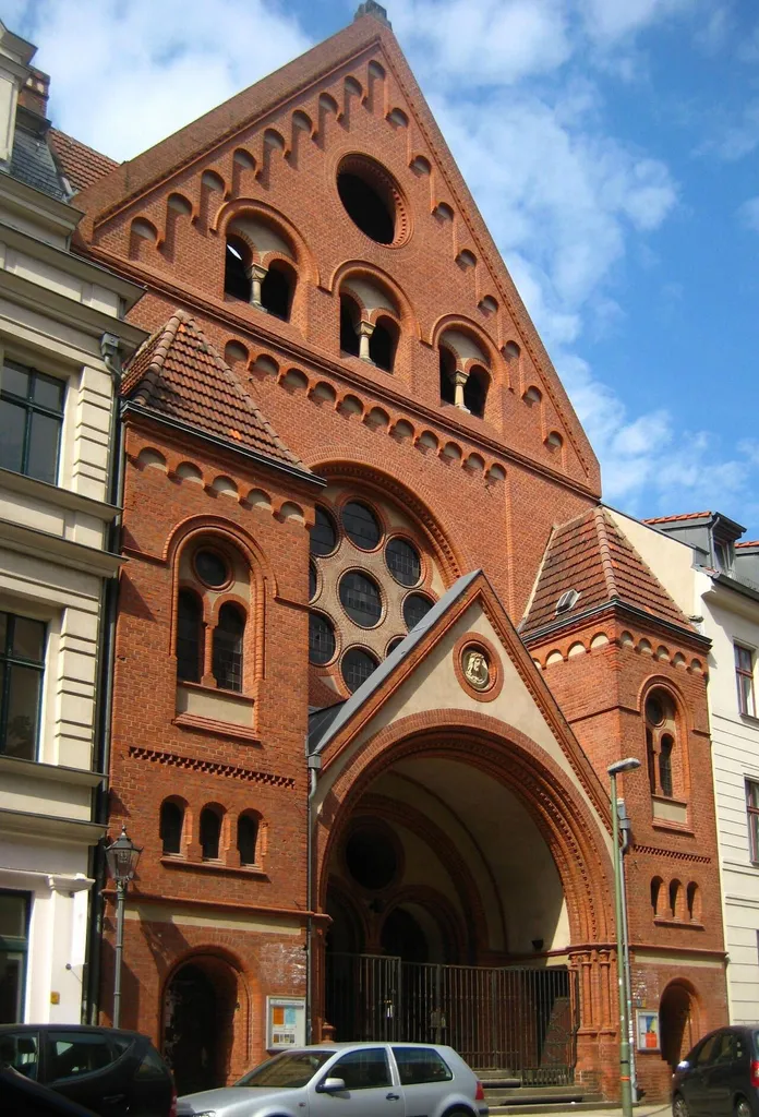 The Saint John the Evangelist Church at Auguststraße No. 90 in Berlin-Mitte. It was built from 1898 to 1900 to a design by the architect Max Spitta. The church has been designated as a historic landmark.