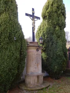 metal cross at the Holy Trinity Church in Hostinné