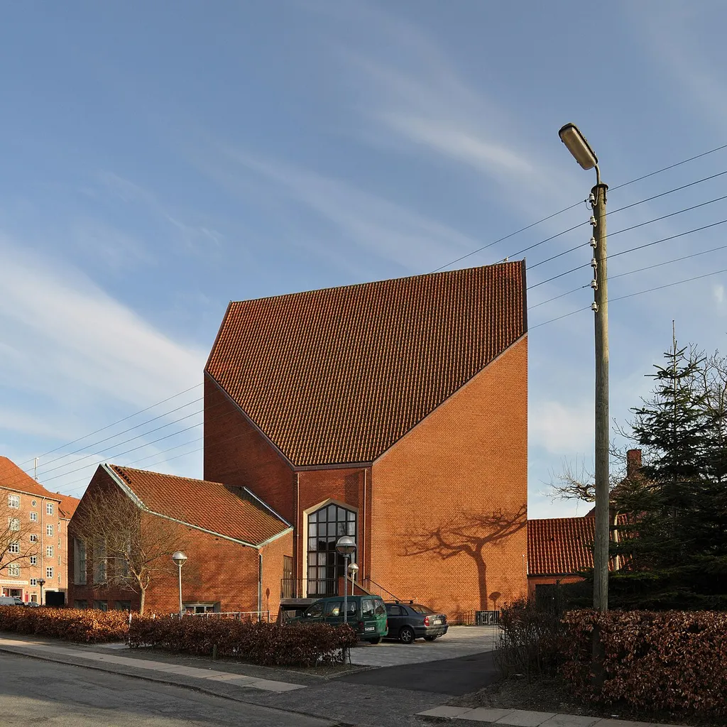 hyltebjerg kirke - church in vanløse, copenhagen 1944-1960. architects: christian (1882-1968), erik (1909-1981) and aage holst (1915-2001). what is a wartime church by holst and sons doing in a set about hans chr. hansen's architecture? well, at the time any copenhagen architect could have told you. in 1942, two years into the nazi occupation of denmark, hans chr. hansen and his partner viggo s. jørgensen finally won one of the many competitions they entered outside their work at the copenhagen municipality. It was for a church in odense and not long after, the holsts won their first prize in vanløse with an almost exact copy of hansen and jørgensen’s project. controversy ensued in the small world of Danish architects and steen eiler rasmussen was called upon to mediate between the two teams. oh, architects! I cringe at the thought. europe was on fire and in copenhagen, five men argued over intellectual property, not a proud moment for any of the involved. but hansen's church was never built and we are left with the copy when trying to understand this critical period in his development. it was very much a project of the hour. massive unemployment and housing shortages led to new public works being undertaken despite the war. with a traumatized cultural life in copenhagen and no access to steel, architects collectively returned to p.v.jensen-klint’s brick nationalism in a movement kay fisker later named the klint school. fisker had already reconciled the klint school with modernism in his seminal aarhus university from 1931, but the wartime projects looked back with greater determination to p.v.jensen-klint, and the churches discussed here are best described as fragments of jensen-klint’s ”krystalknude” or crystal-cluster of church towers, a sketch for a national memorial from 1907. I have briefly discussed some of the consequences of abandoning modernism as it happened during the second world war in danish architecture, here and here. in hansen’s case, I believe it 