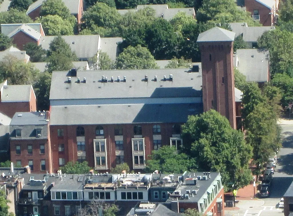 View from the Skywalk of the Prudential Tower at the Prudential Center, 800 Boylston Street, Boston Massachusetts: SE, form3er Shawmut Congregational Church, now Taino Towers.The former Shawmut Congregational Church at 640 Tremont Street at the corner of West Brookline Street in the South End neighborhood of Boston, Massachusetts, was built in 1864, but was destroyed by fire in 1978. It was purchased by Inquilinos Boricuas en Acción, which redeveloped the property into affordable condominiums and street level retail space, under the name "Taino Towers". In 1991, the first units went on sale. (Source: Digital Commonwealth)