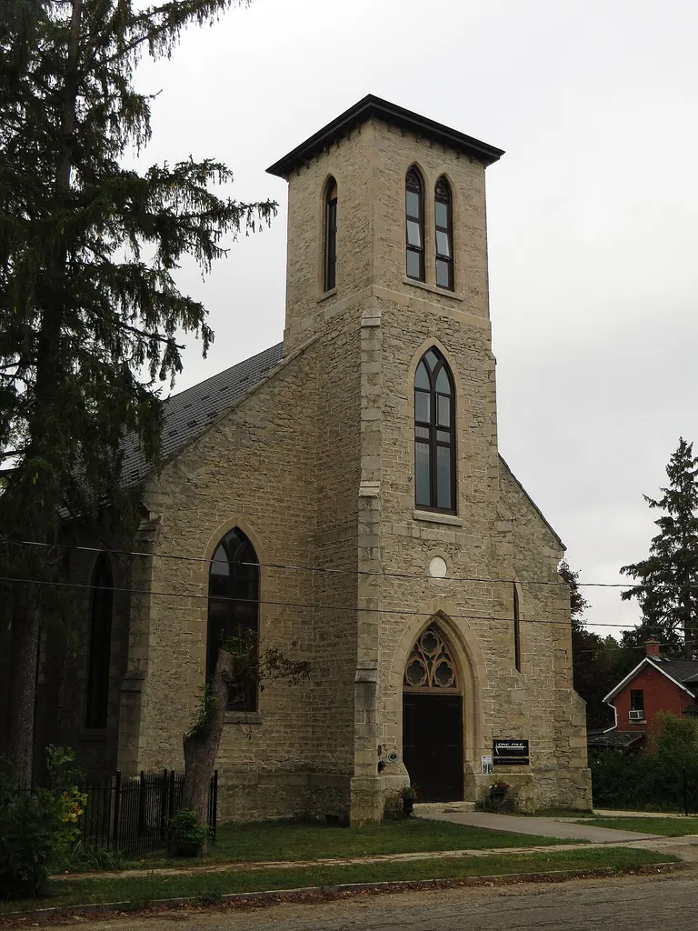 Elora is a community in the township of Centre Wellington, Wellington County, Ontario, Canada. It is well known for its 19th-century limestone architecture, its artistic community and the geographically significant Elora Gorge. Elora was founded in 1832 by Captain William Gilkison, a British officer recently returned from India. Originally called Irvine Settlement, the village was renamed Elora when the post office was established in 1839. Gilikson named the community after his brother's ship, which was itself inspired by the Ellora Caves near Aurangabad, Maharashtra, India. Originally part of Nichol Township, Elora was incorporated as a village in 1858 and remained as such until it was amalgamated with Fergus and portions of Eramosa, Nichol, Pilkington and West Garafraxa Townships to form Centre Wellington in 1999. Elora had a population of 4,546 according to the 2001 Census, the last to record the village's population as a separate entity. The Elora Gorge is at the western edge of the village, adjacent to the Elora Gorge Conservation Area. At the eastern end of the village is the Elora Quarry Conservation Area, a scenic former limestone quarry, which is now a popular swimming area. The Elora Quarry was used to film a couple of scenes in the movie Angel Eyes. Both of these conservation areas are under the authority of the Grand River Conservation Authority. Elora is also a noted tourist attraction, with a waterfall and small islet called the "Tooth of Time", overlooked by an old mill, numerous small shops and art galleries. The Gorge Cinema is Canada's oldest continuously running repertory theatre. The Elora Mill is Ontario's only remaining five-story mill and has been renovated as a prestigious inn and restaurant. The village is a terminus to Ontario's scenic 47-km Elora Cataract Trailway to its east, and is just 10 km from the Trans Canada Trail to its southwest. Elora is also known for its unique shops and its quaint cafés and restaurants, which lie along the ri