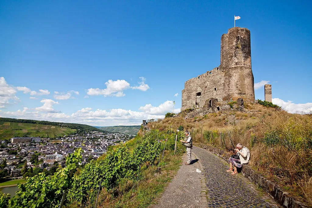 The hill castle Landshut in Bernkastel-Kues, Germany, and view over Kues across the Moselle. The castle fell victim to fire in 1692 and has since been a ruin.