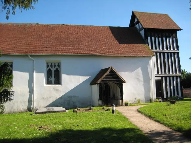 Warndon Church Warndon church is dedicated to St Nicholas and used to be surrounded by countryside but now the urban spread of Worcester has reached it with the building of the Warndon Villages estate in the last fifteen years or so. The north and south doorways have Norman arches and as can be seen the tower is half-timbered.