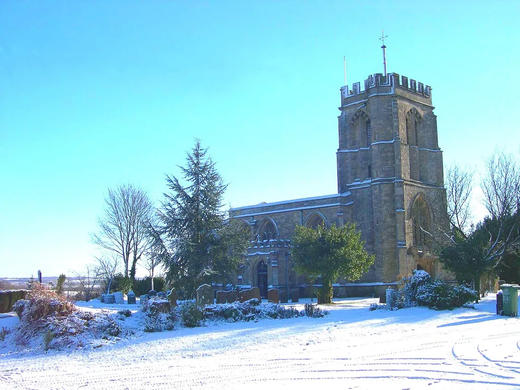 St Edmund's parish church, Maids Moreton, Buckinghamshire, England, seen from the northwest in snow