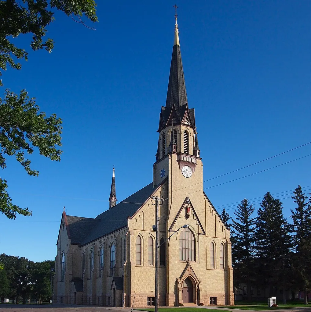 Church of the Sacred Heart, 110 3rd Ave NE, Freeport, Minnesota, USA. Viewed from the northwest. This is an image of a place or building that is listed on the National Register of Historic Places in the United States of America. Its reference number is 91000906 (Wikidata).