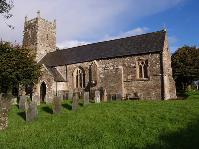 St Michael's church, Meeth Plenty of Norman work is evident. Seen from the edge of the churchyard, which is set up above the main road.