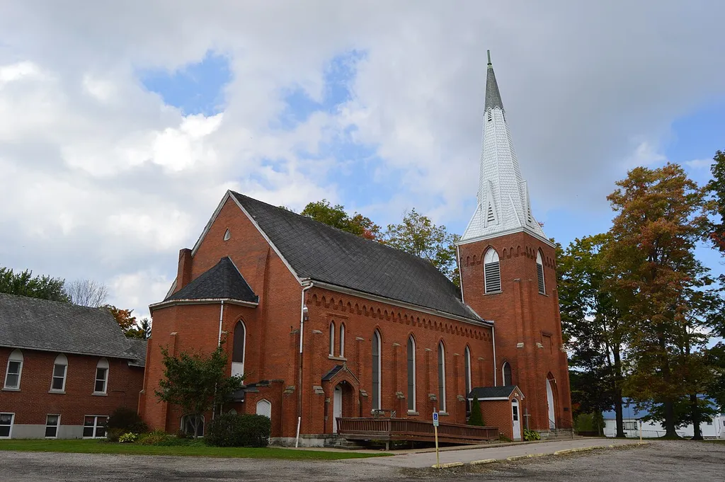 Rear and eastern side of the Congregational Church of Austinburg, located on the southern side of State Route 307 in Austinburg, Ohio, United States. Built in 1877, it is listed on the National Register of Historic Places.