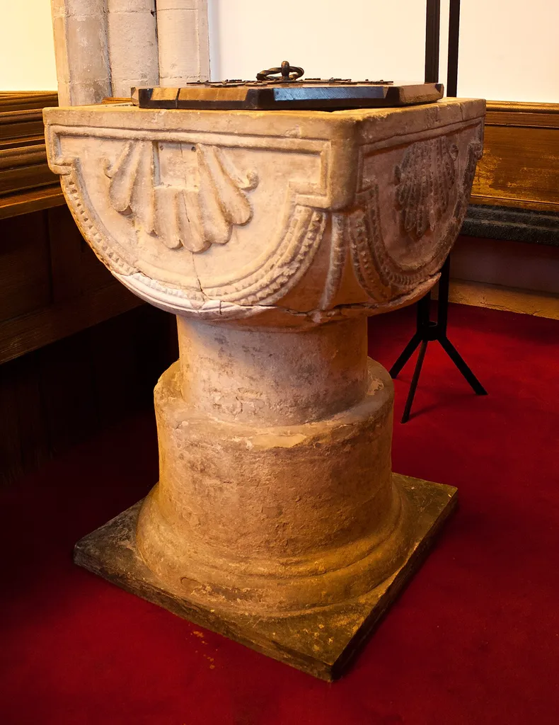 12th-century baptismal font of Dundry stone in the north nave, discovered in 1848. The work appears to be close to that of the masons from the west of England. See p. 89 of Mary McMahon: St Audoen's Church, Cornmarket, Dublin: Archaeology and Architecture, ISBN 0-7557-7315-2, and p. 338 of Christine Casey: The Buildings of Ireland: Dublin, ISBN 978-0-300-10923-8.
