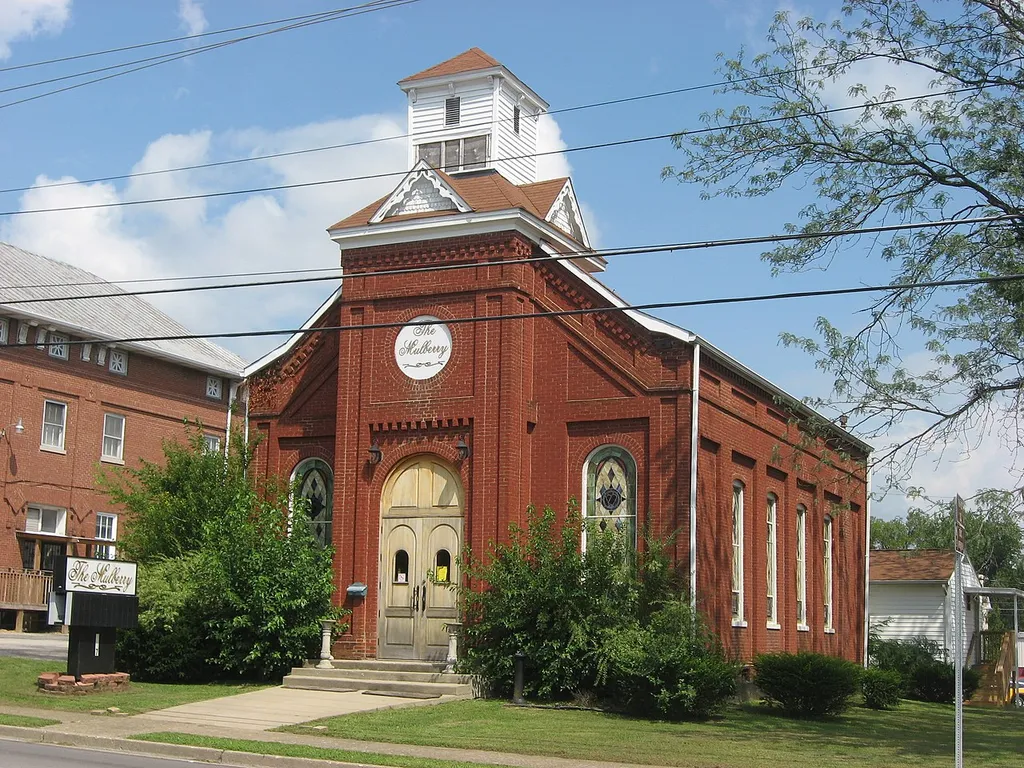 Front and southern side of the Embry Chapel Church, located at 117 N. Mulberry Street (U.S. Route 62) in Elizabethtown, Kentucky, United States. Built in 1868, it is listed on the National Register of Historic Places.