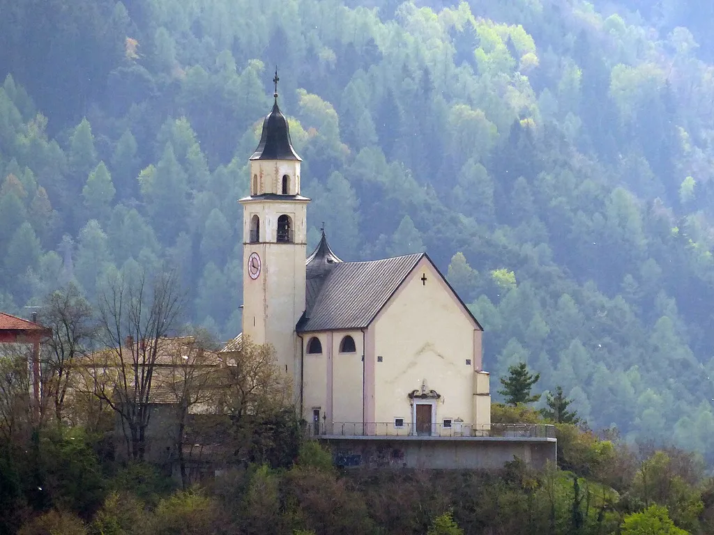 Holy Trinity church of Segonzano as seen from the SS612 road, between Valda and Faver (Trentino, Italy)