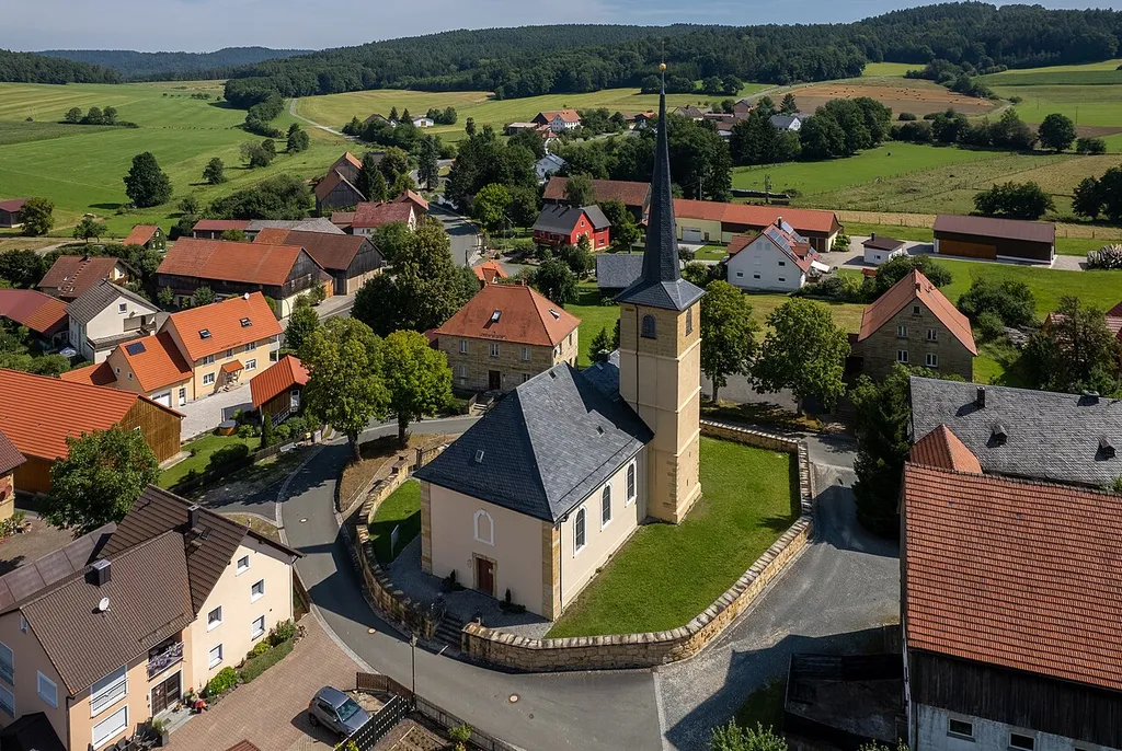Aerial view of the church in Poppendorf in the municipality of Ahorntal