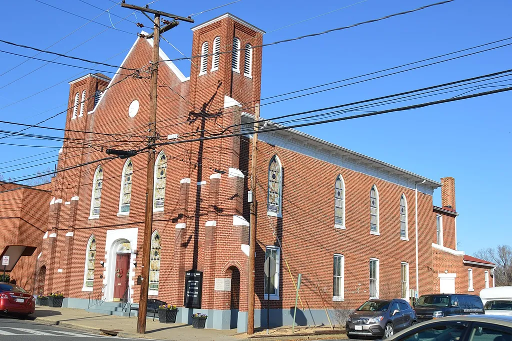 Front and southern side of Shiloh Baptist Church (Old Site), located at 801 Sophia Street in Fredericksburg, Virginia, United States. Built in 1890, it is listed on the National Register of Historic Places.