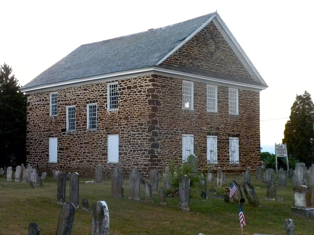 Old Stone Church on NRHP since May 12, 1977. North of Cedarville, New jersey on NJ 553 in Cumberland County. Church abandoned but it and graveyard maintained about 1850 so old forms kept. Old forms in this case being Quaker inspired architecture in a Presbyterian Church.