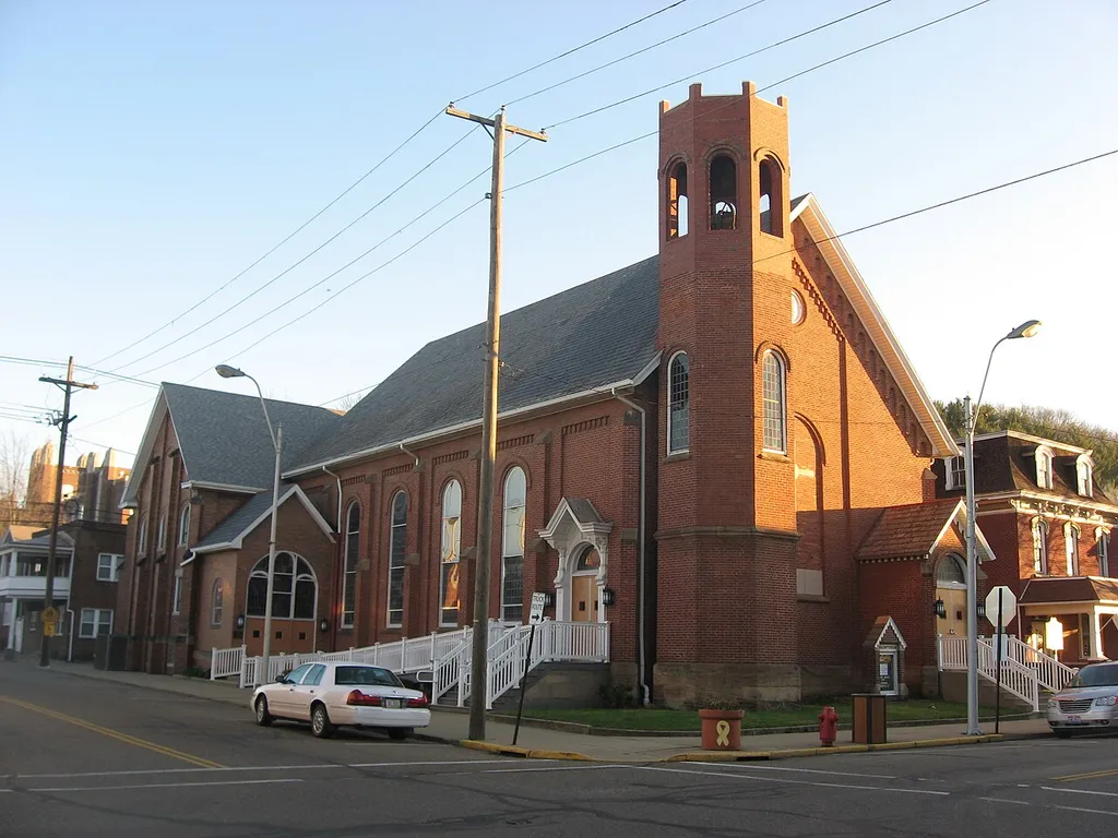 Front and western side of the Presbyterian Church of Dennison, located at 301 Grant Street in downtown Dennison, Ohio, United States. Built in 1870, it is listed on the National Register of Historic Places as "The Railway Chapel".