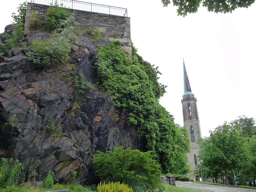 The castle rocks and the St. Cross church in Falkenstein, Saxony, Germany.