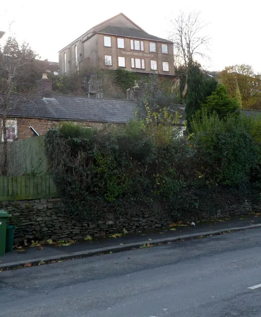 Calvary, a church on a hill, Treforest. Calvary Baptist Church, Cliff Terrace, viewed from Broadway. The church was built in 1851-1852 as Calvary English Baptist Church, "English" signifying the language used for the services in an era when Welsh was more widely spoken in Treforest than it is today. When the church first opened, the surrounding area was heavily wooded, with very few dwellings nearby. It was considered a dangerous place to be at night.