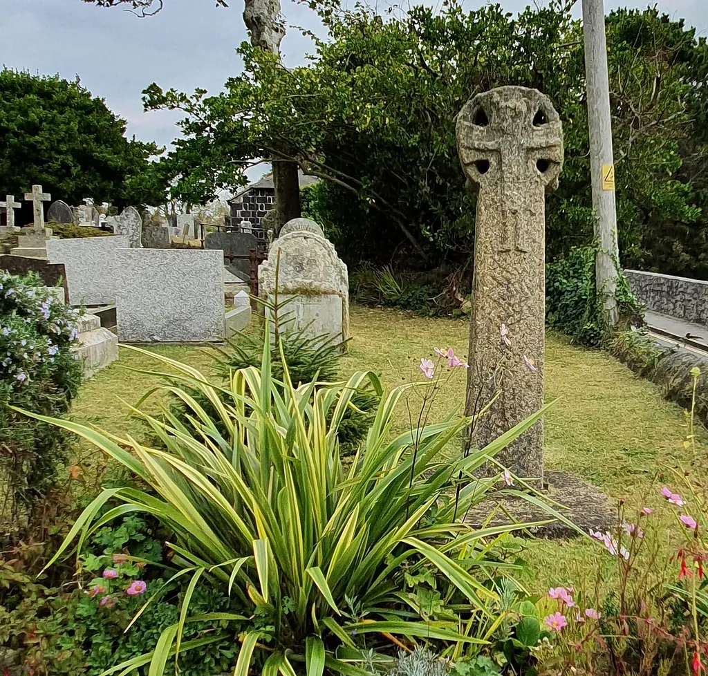 Pre-Conquest, grade II listed granite cross in St Phillack churchyard.