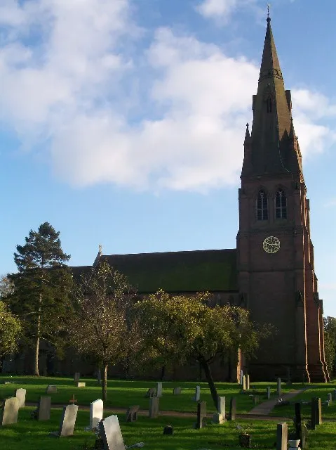 SS Philip and James' Church, Hallow, Worcestershire, seen from the north as the west side is lit by low late afternoon November sun