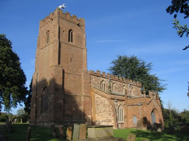 St Botolph's Church, Newbold-on-Avon. The church on the hill in the village, with the old canal tunnel leading under part of the churchyard.