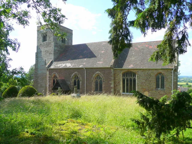 Ss. Philip and James' church, Tarrington Viewed from under a large yew tree in the south-east corner of the churchyard.
